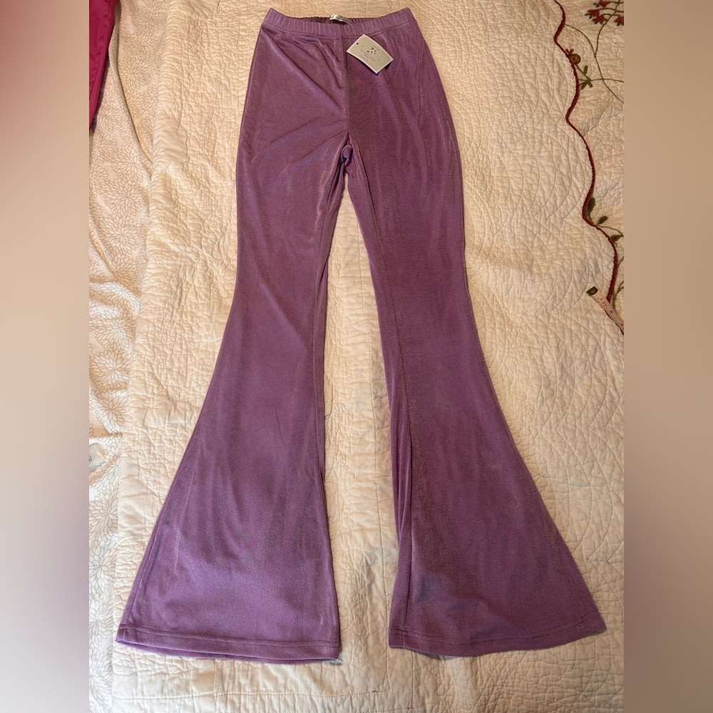 Purple, metallic, festival bell bottoms.